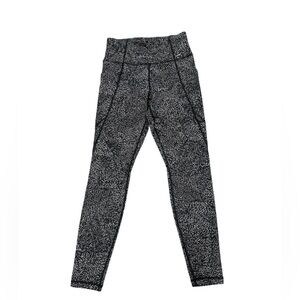 Athleta Salutation Stash Pocket Rainwater‎ Leggings Athletic Black White SIZE XS